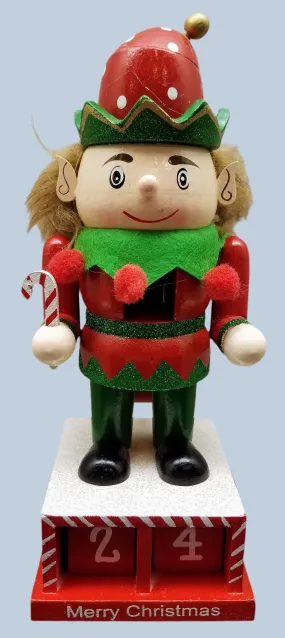 Elf nutcracker with candy cane & calendar 8"